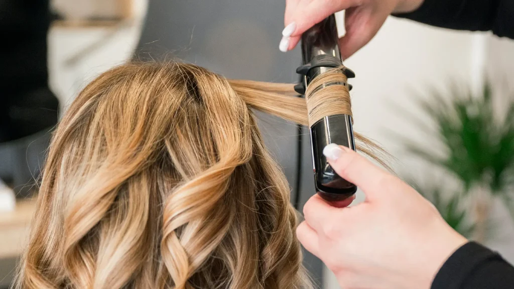 Hair Stylist Curling Hair